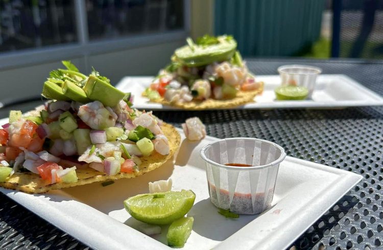 shrimp tacos on an outdoor table