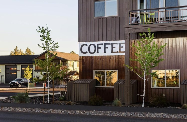 brown building with coffee sign on the exterior