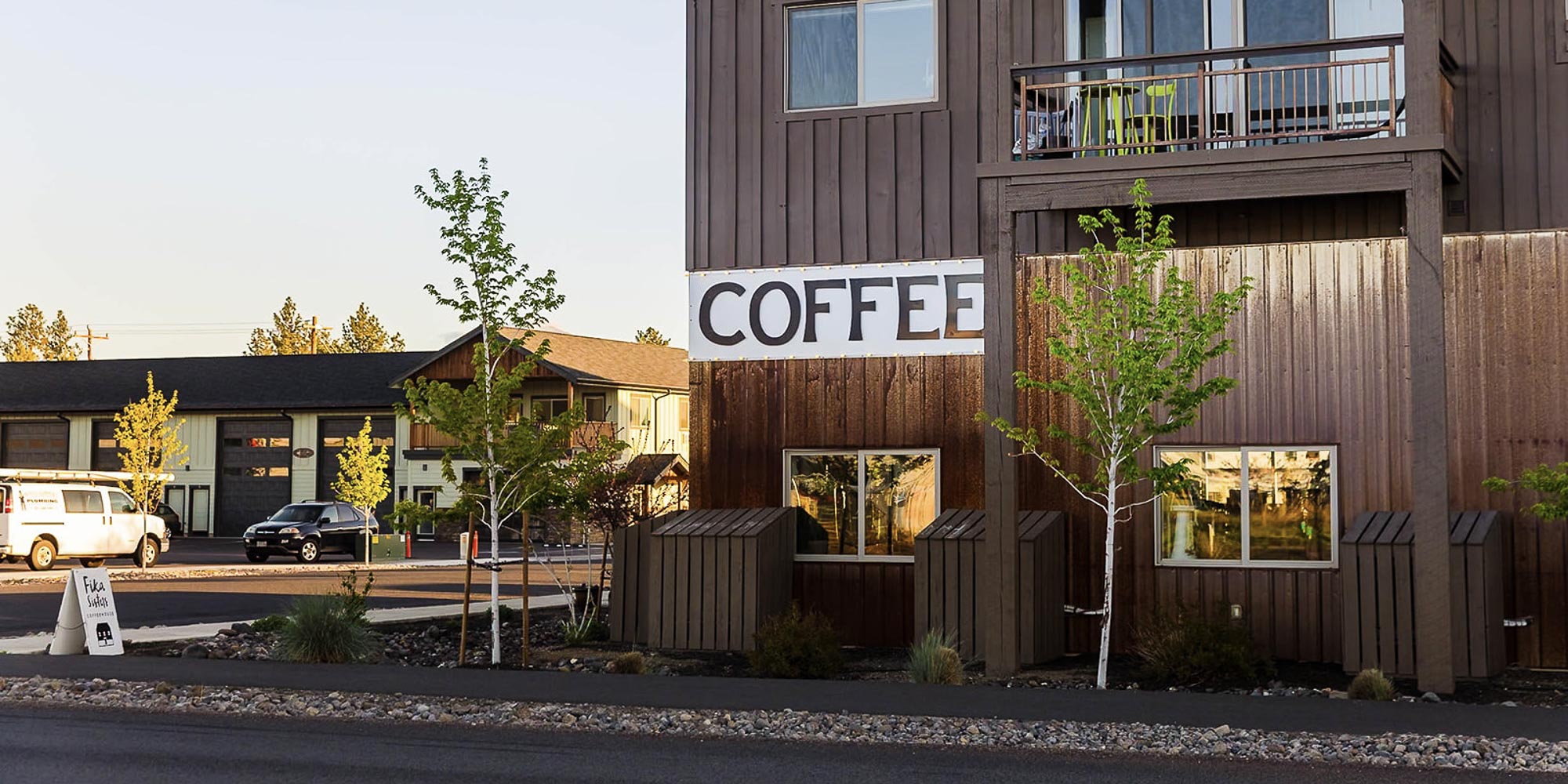 brown building with coffee sign on the exterior