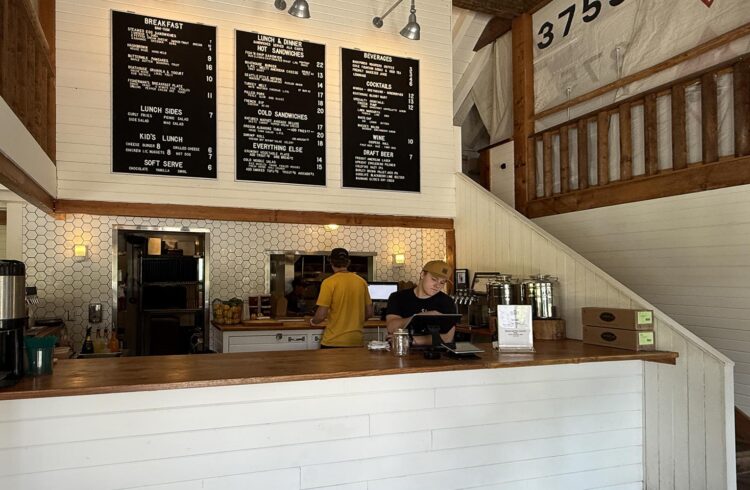restaurant counter with chalkboard menus