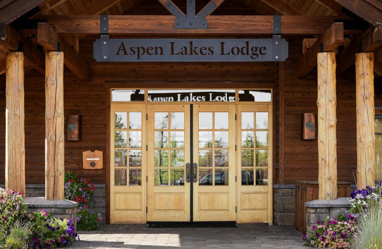 front doors and landscaping at aspen lakes lodge