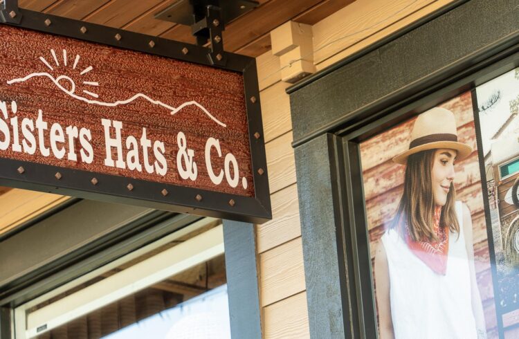 Sisters Hats sign and exterior