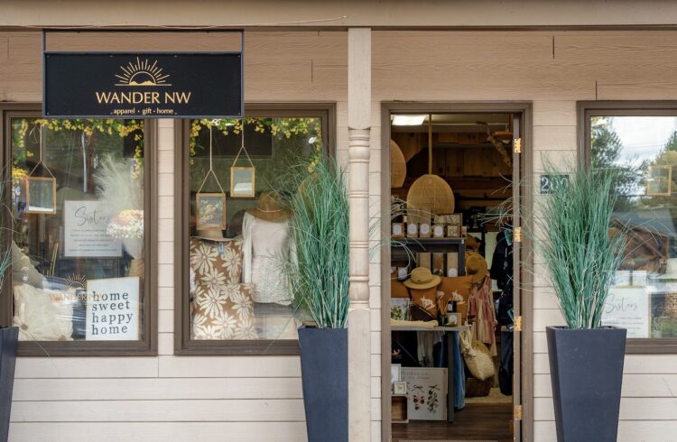 storefront with plants and window displays