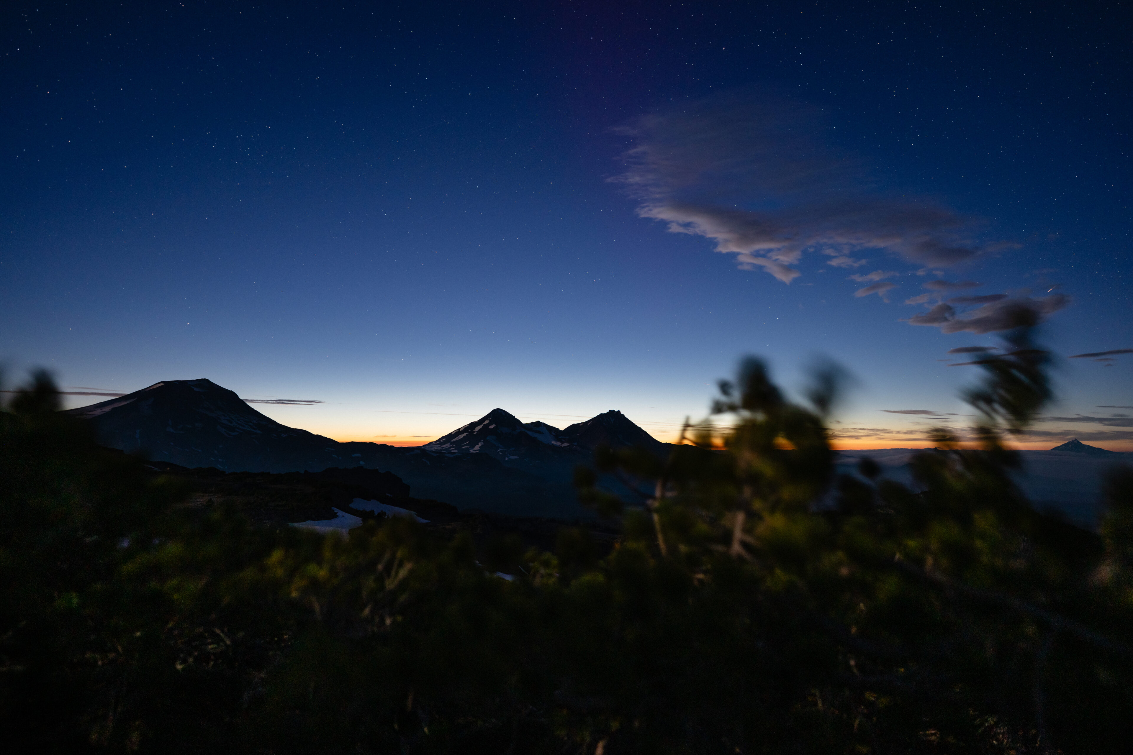 Sunset behind the Three Sisters mountains
